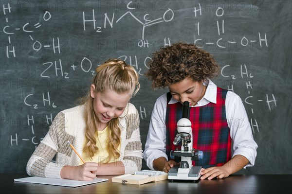 Students doing experiment in science class