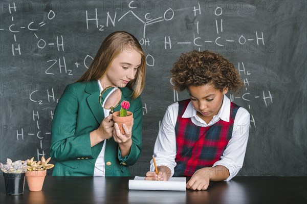 Students doing experiment in science class