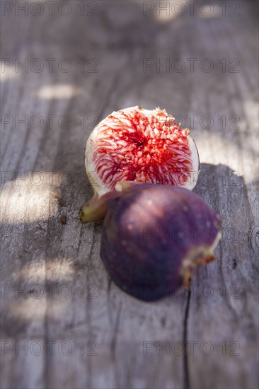 Close up of fresh sliced fig on board