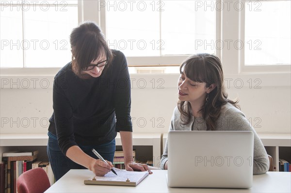 Businesswomen working together in office
