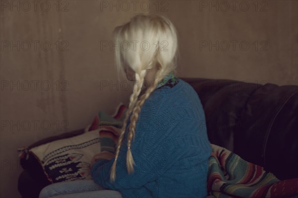 Rear view of woman with braid pigtails