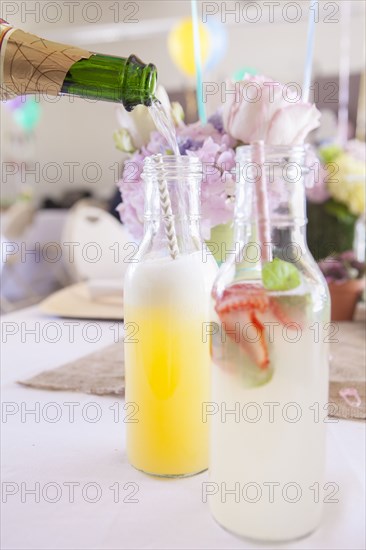 Soda and cocktails on party table