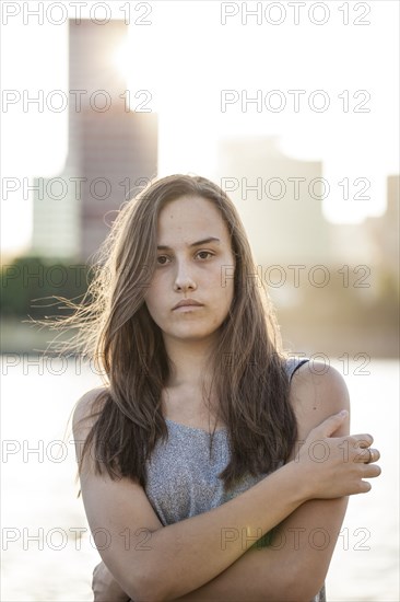 Serious woman with arms crossed