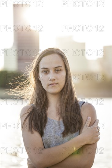 Serious woman with arms crossed