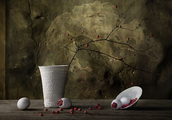 Vase and spilling plate with berries