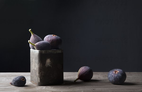 Figs in jar on countertop