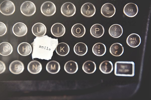 Close up of smile note on typewriter