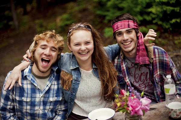 Friends laughing in forest