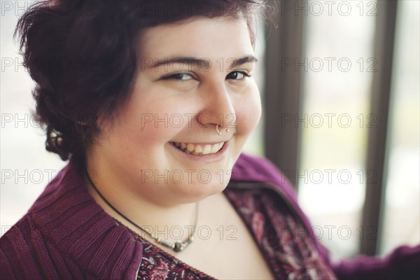 Close up of smiling Caucasian woman