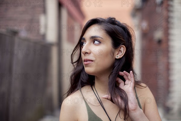 Mixed race woman in city