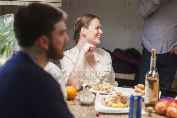 Friends enjoying dinner party