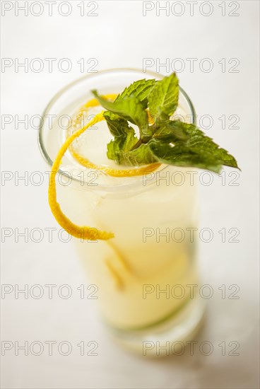 Close up of glass of lemonade with garnish
