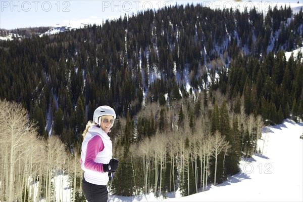 Woman skiing on snowy slope