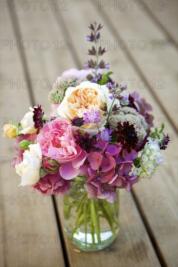 Close up of bouquet of flowers in glass vase