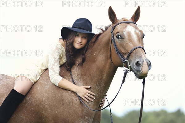 Woman riding horse