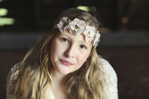 Close up of Caucasian girl wearing flower crown