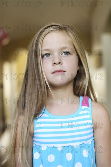 Close up of serious girl with long hair