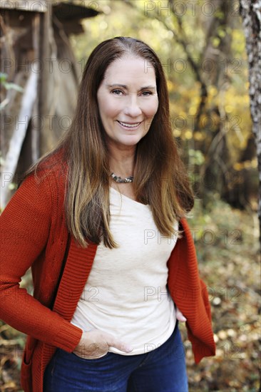 Caucasian woman standing in backyard