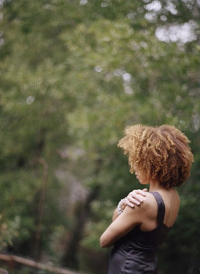 Rear view woman admiring forest view