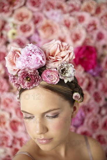 Smiling woman wearing flowers in her hair