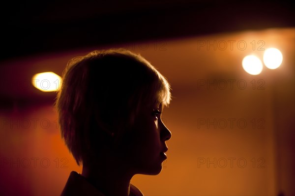 Close up profile of Asian woman