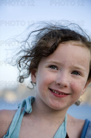 Close up of Caucasian girl smiling outdoors