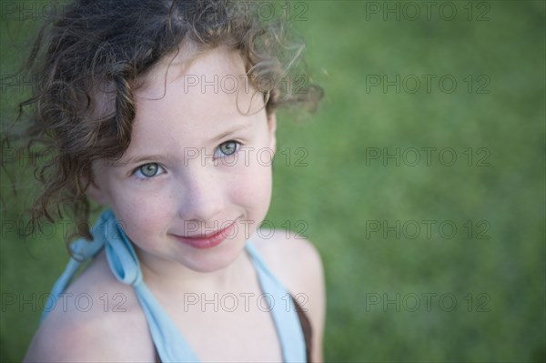 Close up of Caucasian girl smiling outdoors