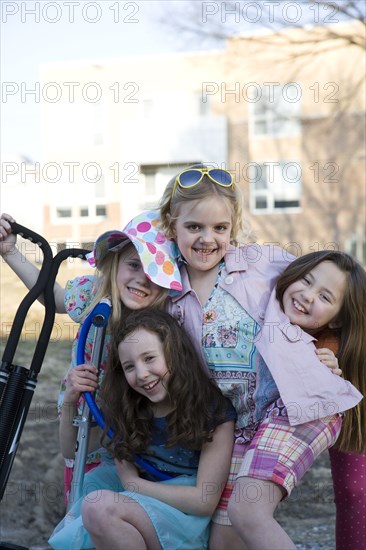 Smiling girls playing in park