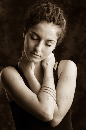 Close up of serious woman with dreadlocks