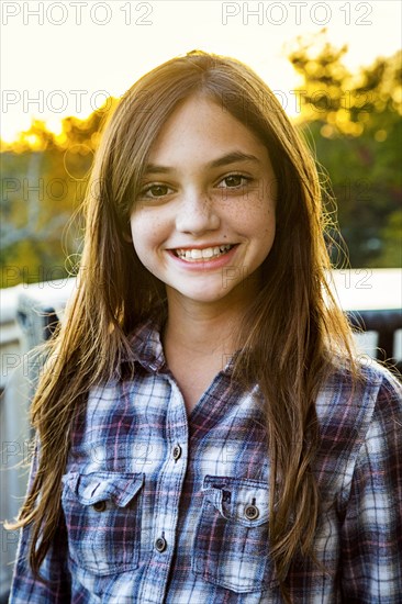 Close up of smiling Caucasian teenage girl