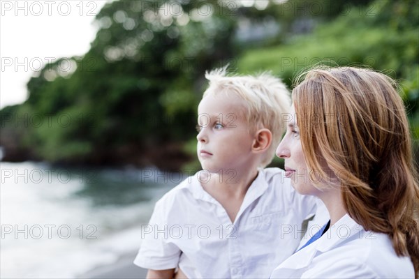 Doctor and son admiring ocean