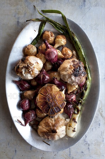 Plate of roast vegetables and garlic