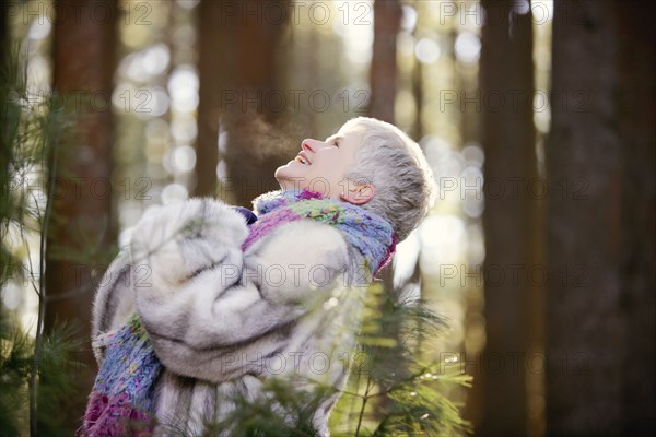 Older Caucasian woman standing outdoors