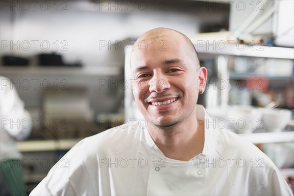 Hispanic male chef in kitchen