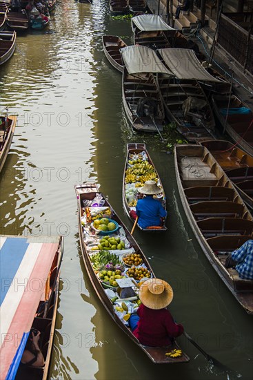 High angle view of merchants selling fruit in canoes