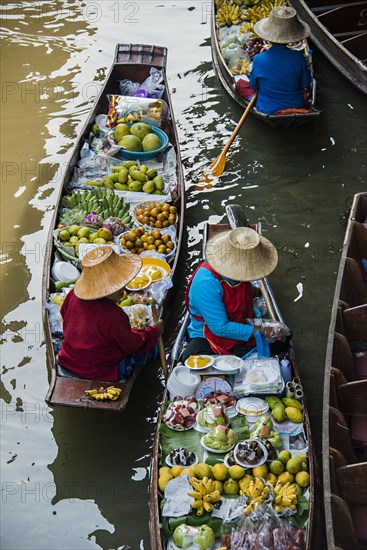 High angle view of merchants selling fruit in canoes