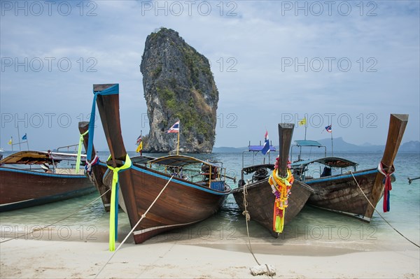 Canoes docked on beach