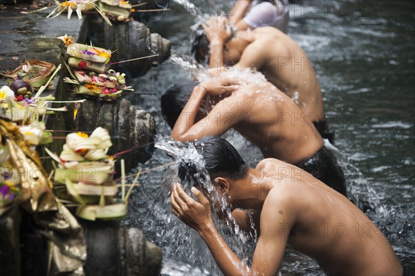 High angle view of men washing in fountains