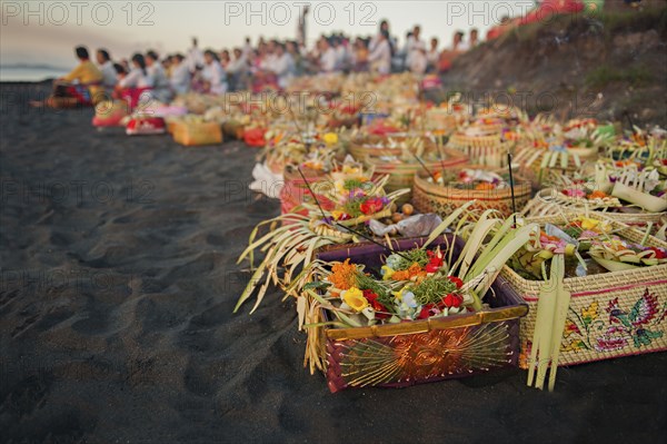 Close up of baskets of flowers on beach