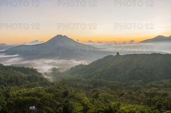 Hilltops over morning fog in remote landscape