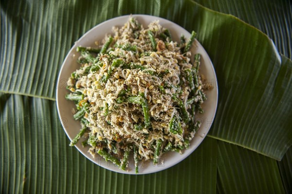 Close up of plate of food on leaves