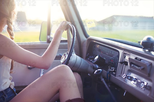 Caucasian woman driving car