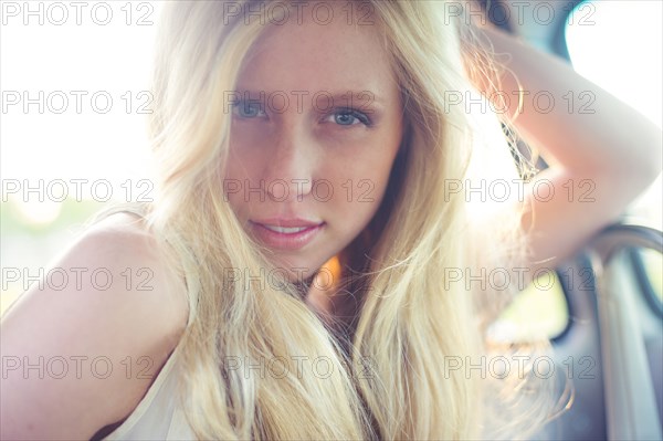 Caucasian woman sitting in car