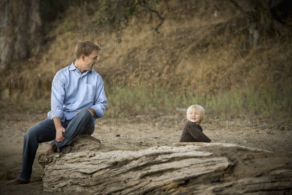 Caucasian father and son enjoying park