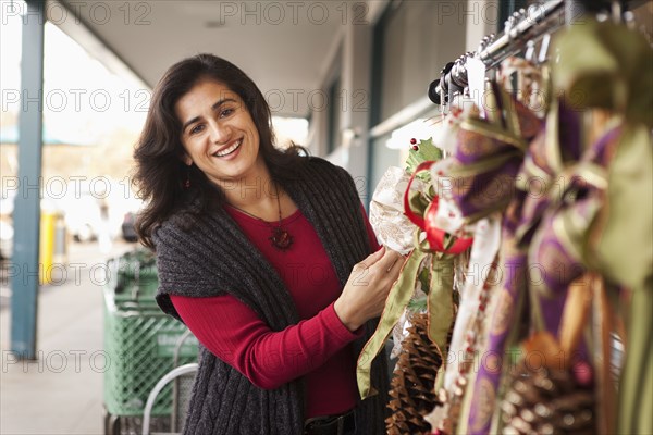 Woman looking at merchandise for sale