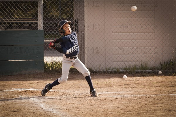 African American boy playing baseball