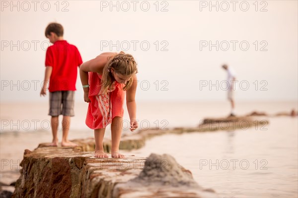 Children playing on jetty