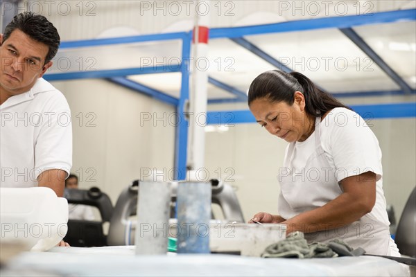 People working in manufacturing plant