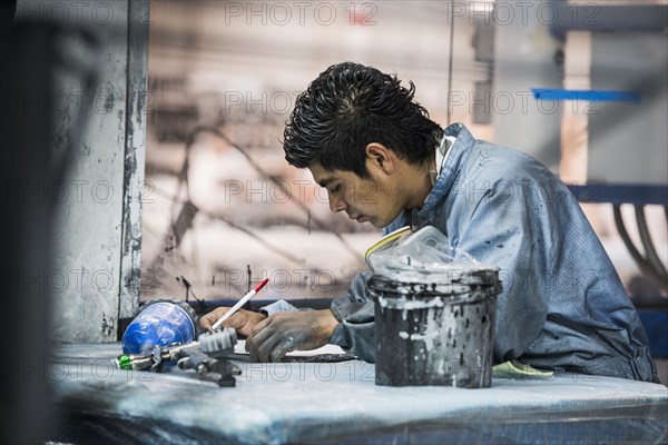 Man working in manufacturing plant