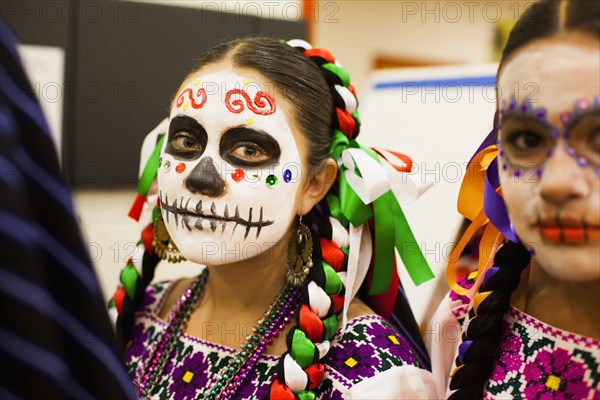 Hispanic children celebrating Dia de los Muertos